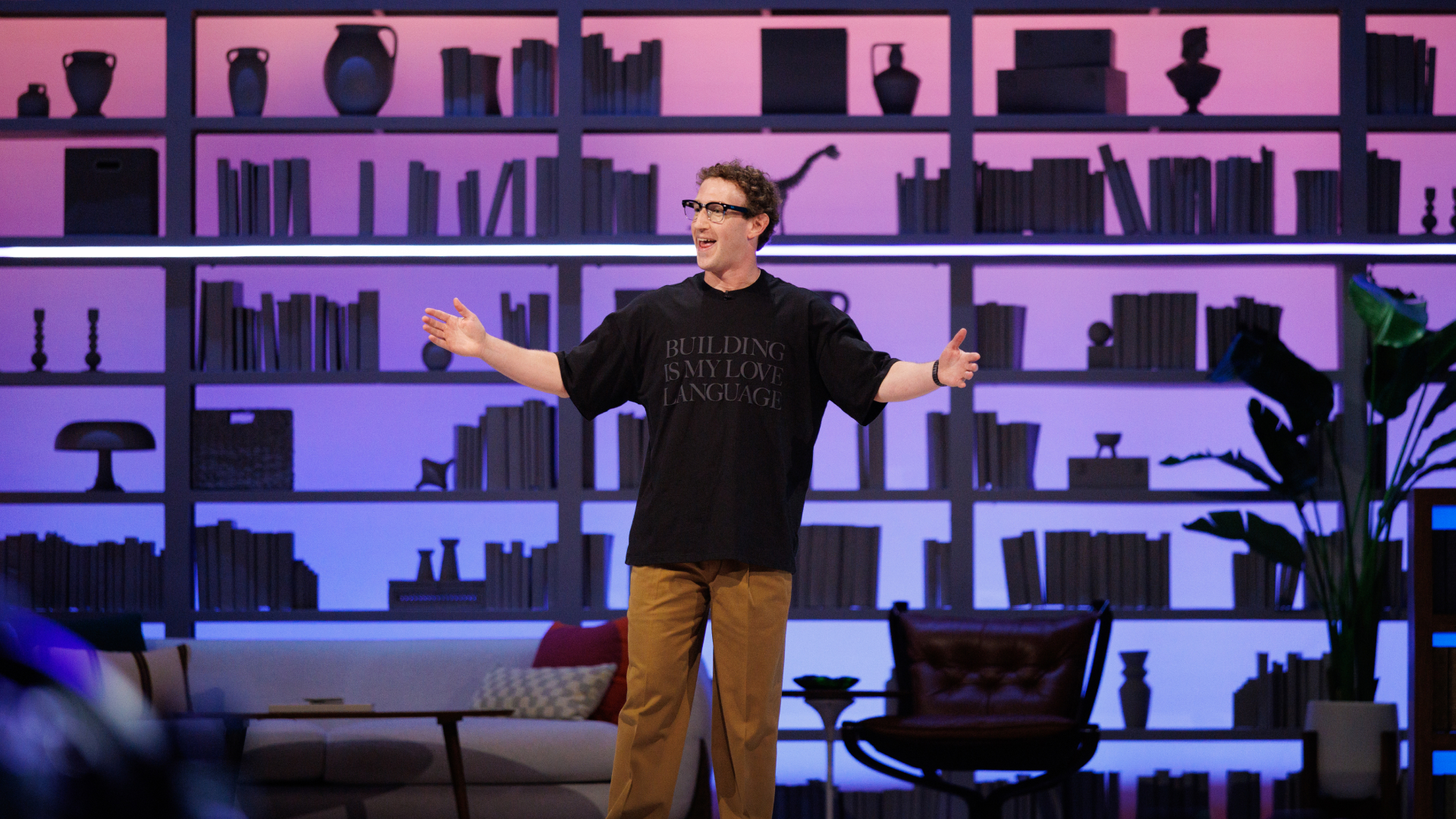 Mark Zuckerberg on stage at Meta Connect 2026, in front of shelves lit purple and blue.